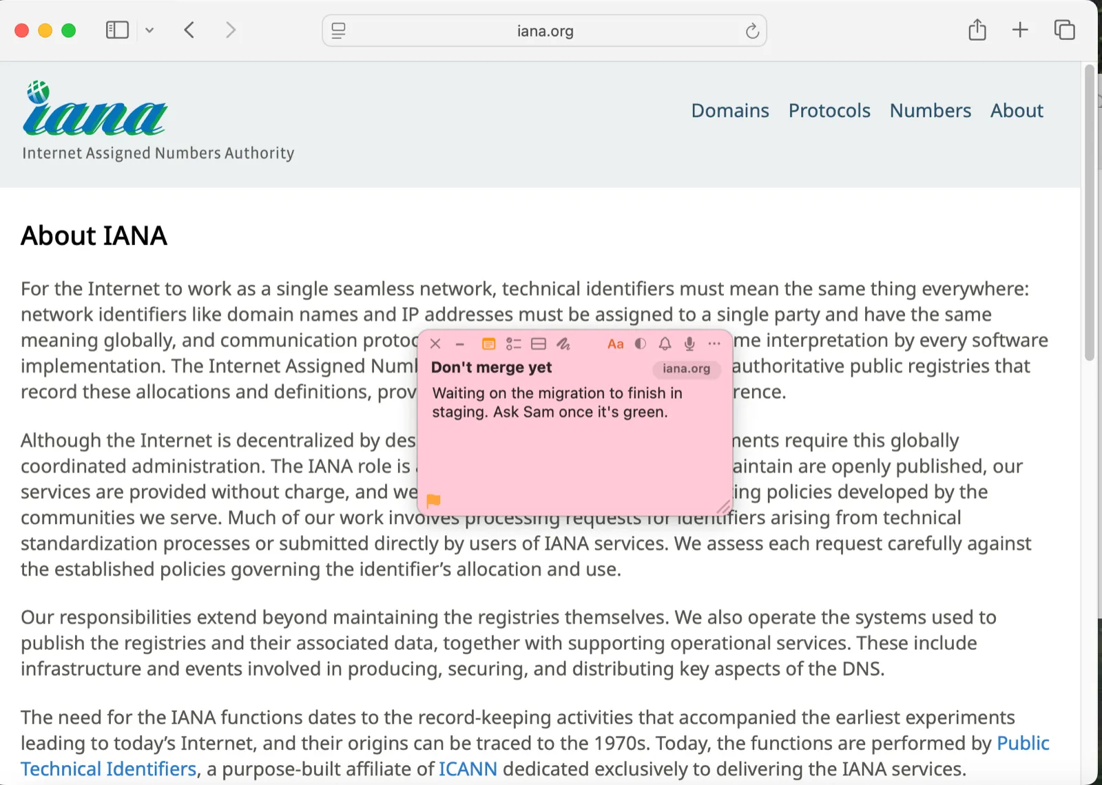 A pink TackNote reading "Don't merge yet" on a different page of the same site, showing that notes are scoped per page